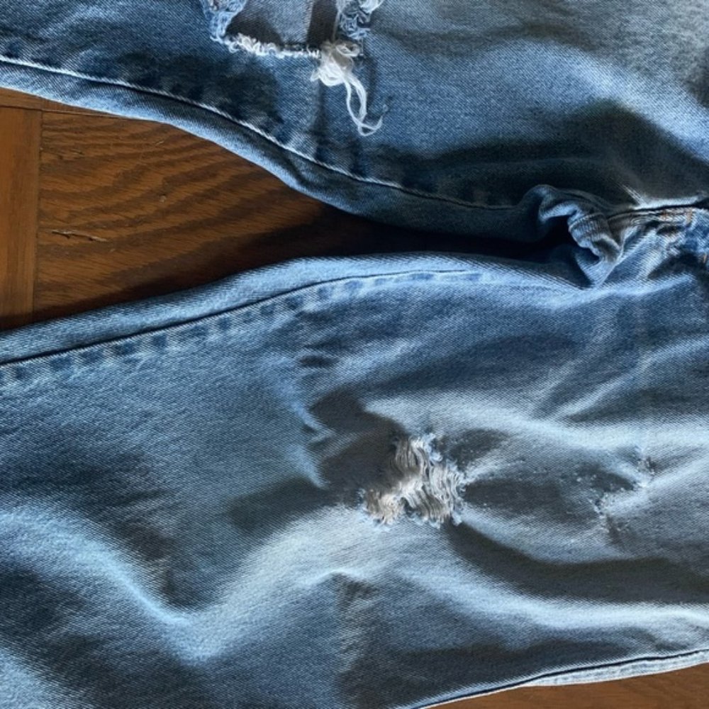 Distressed Blue Jeans Double Knot